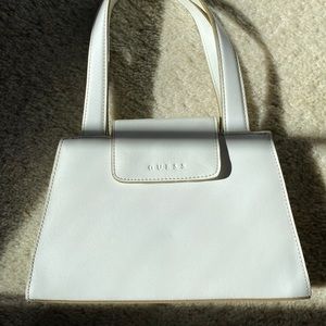 White Guess handbag.